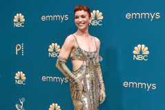 "Severance" star Britt Lower sparkled in a sequined cut-out gown and matching opera gloves. Credit: Chris Delmas/AFP/Getty Images