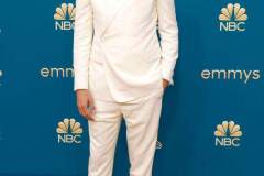 Nicholas Braun in an all-white suit with a sparkling collar detail by Dior Men. Credit: Frazer Harrison/Getty Images