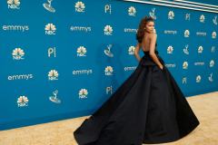 Zendaya, serving Hollywood glamour in a black strapless Valentino gown and satin headband